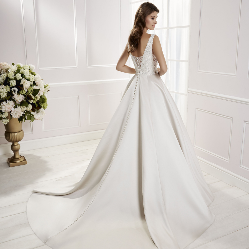 Rear profile of model wearing Ronald Joyce wedding dress style Cora, 69466